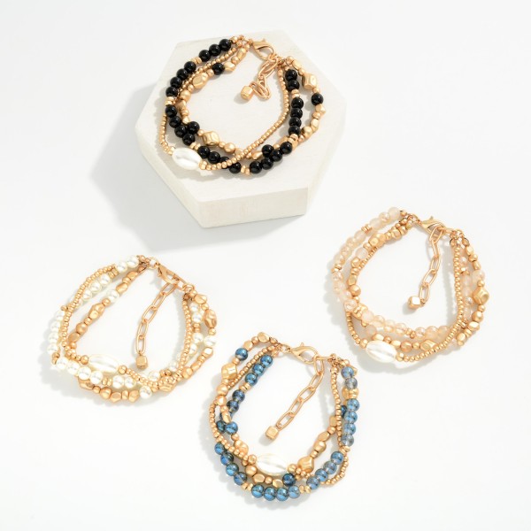 Set Of 3 Beaded Stretch Bracelets Featuring Gold Nugget Beads & Pearl Detail 

- Approximately 3" D