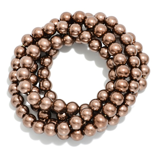 Set Of Four Metallic Brown Beaded Stretch Bracelets 

- Approximately 3" D
