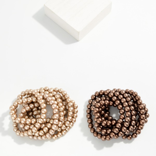 Set Of 8 Metallic Brown Beaded Stretch Bracelets 

- Approximately 3" D