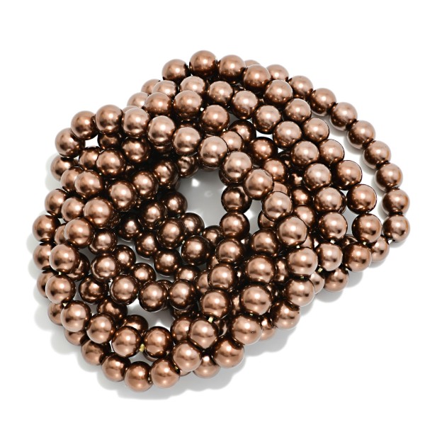 Set Of 8 Metallic Brown Beaded Stretch Bracelets 

- Approximately 3" D