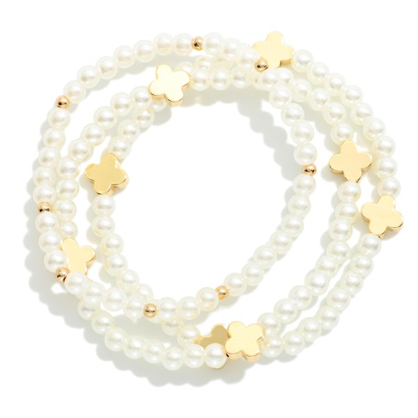 Set Of Three Beaded Stretch Bracelets Featuring Plus Cross Stations 

- Approximately 2.5" D
