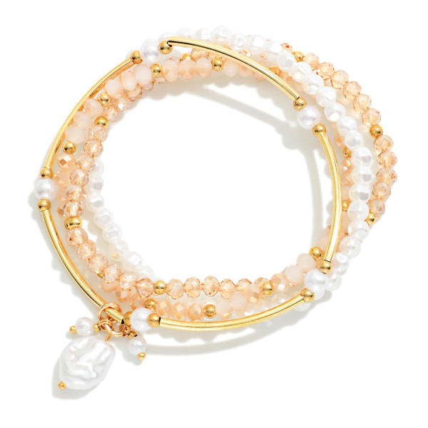 Set Of Four Beaded Stretch Bracelets Featuring Pearls, Metal Tone Tube Beads, & Faceted Beads 

- Approximately 2.5" D