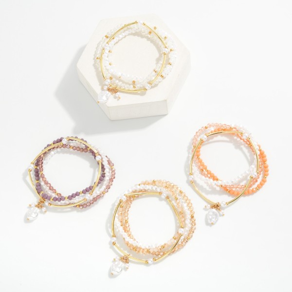 Set Of Four Beaded Stretch Bracelets Featuring Pearls, Metal Tone Tube Beads, & Faceted Beads 

- Approximately 2.5" D