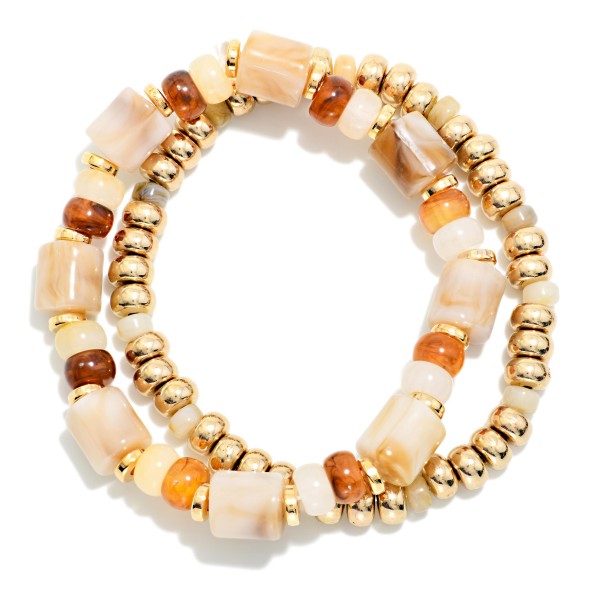 Set Of Two Beaded Stretch Bracelets Featuring Metal Tones & Marbled Acetate Cylinders 

- Approximately 2.5" D
