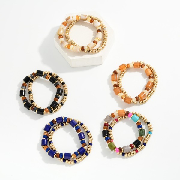 Set Of Two Beaded Stretch Bracelets Featuring Metal Tones & Marbled Acetate Cylinders 

- Approximately 2.5" D