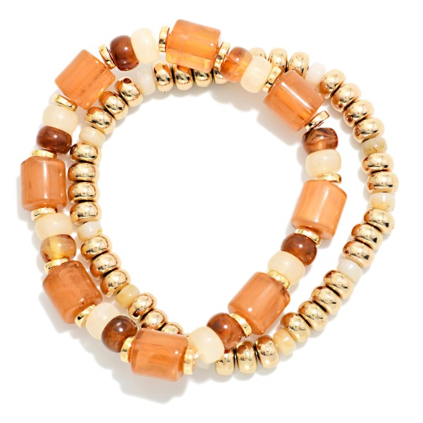 Set Of Two Beaded Stretch Bracelets Featuring Metal Tones & Marbled Acetate Cylinders 

- Approximately 2.5" D