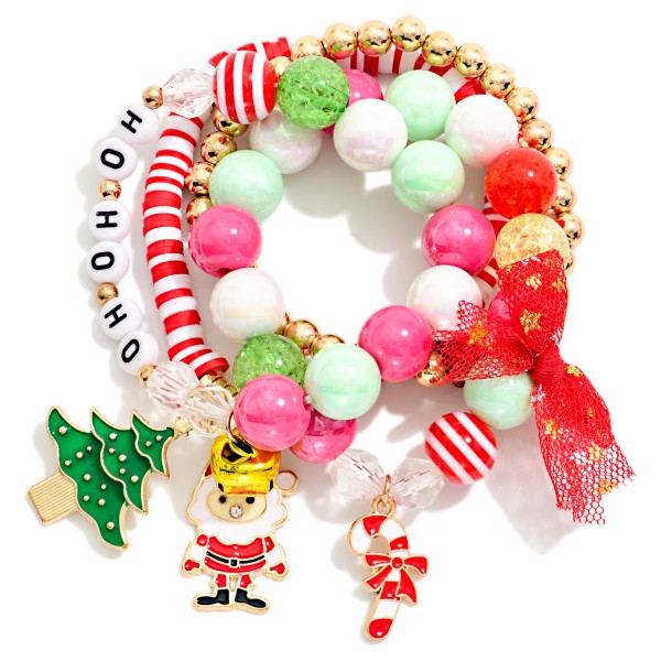 Set Of Four Multi Bead Beaded Stretch Bracelets Featuring Jingle Bells & Enamel Charms 

- Approximately 3.5" D