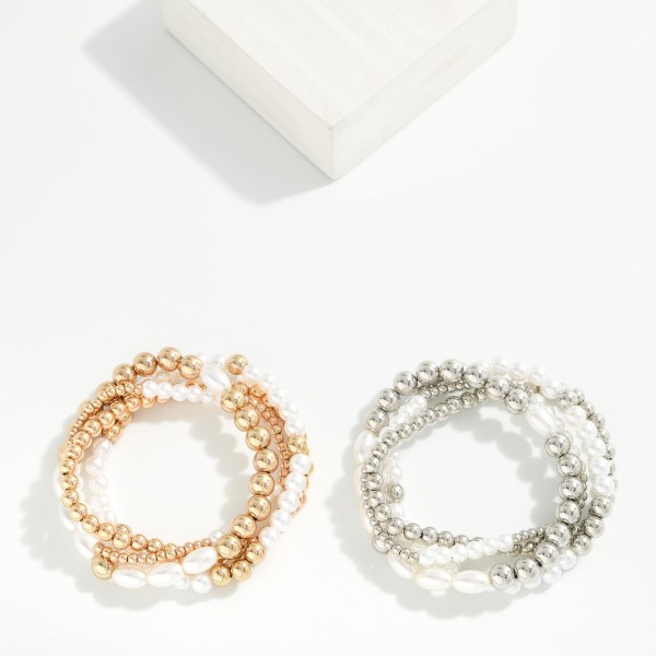 Set Of 4 Metal Tone & Pearl Beaded Stretch Bracelets 

- Approximately 2.5" D