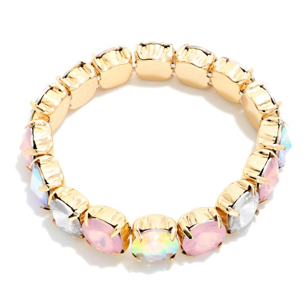 Oval Crystal Stretch Bracelet set with large faceted glass stones in polished cup settings for a soft, glowing jewel box look. The stretch fit slips on easily and stacks well with bangles and watches. Pretty for holiday parties, bridal events, and adding sparkle to everyday outfits. Glamorous crystal bracelets are proven impulse sellers and pair with matching crystal necklaces for easy set sales.