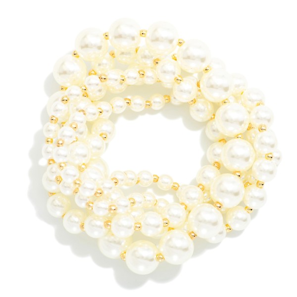 Set Of Five Multi Size Pearl Beaded Stretch Bracelets With Petite Metal Tone Bead Accents 

- Approximately 2.5" D