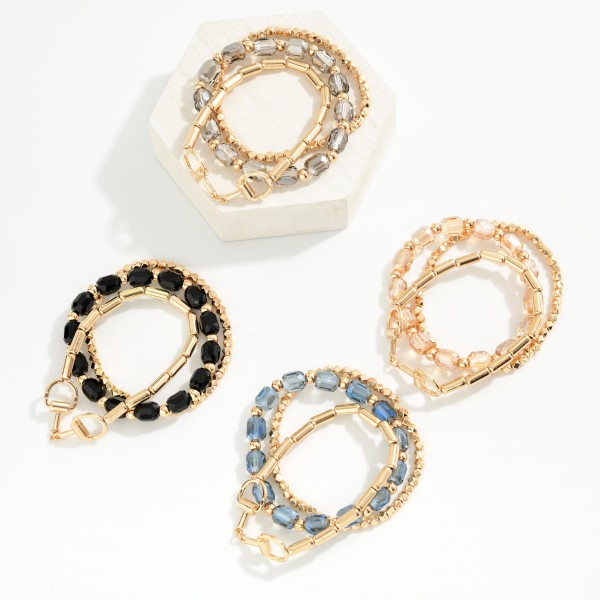 Chain and Bead Bracelet Set combining a polished link chain bracelet with stretch strands of faceted glass beads and metal accents. The mix of chain and beads creates an effortless, collected stack in one purchase. Easy to wear together or apart. A versatile, giftable set that pairs with everyday outfits and sells well alongside watches and bangles.