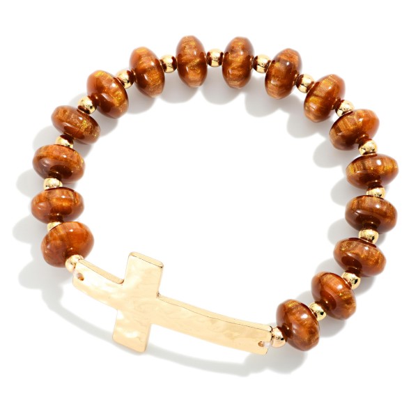 Sideways Cross Beaded Stretch Bracelet featuring faceted glass rondelle beads with a polished east west cross centerpiece. The glass beads have a soft sparkle that pairs with any bracelet stack. Comfortable stretch fit with no clasp. A subtle faith piece for everyday wear and a thoughtful gift for baptisms, confirmations, and Easter.
