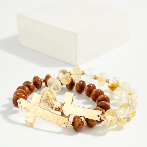 Sideways Cross Beaded Stretch Bracelet featuring faceted glass rondelle beads with a polished east west cross centerpiece. The glass beads have a soft sparkle that pairs with any bracelet stack. Comfortable stretch fit with no clasp. A subtle faith piece for everyday wear and a thoughtful gift for baptisms, confirmations, and Easter.