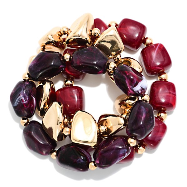 Chunky Nugget Stretch Bracelet Set mixing glossy marbled resin stones with polished metal nuggets for a bold, collected stack. Wear the strands together for maximum impact or split them up to layer with watches and bangles. Elastic stretch construction slips on easily and fits most wrists. Ready made stacks give shoppers a complete look in one grab, which makes this set a quick turning favorite for boutique bracelet displays.