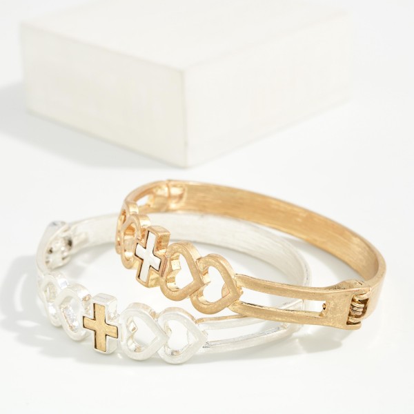 Mixed Metal Cross Hinged Bangle Bracelet featuring a polished band with an open link design and a small cross accent in a contrasting metal tone. The hinged closure opens for easy on and off and stays secure. A meaningful everyday piece that stacks well with watches and beaded bracelets. A thoughtful faith gift for Easter, baptisms, and the holidays at an accessible price.