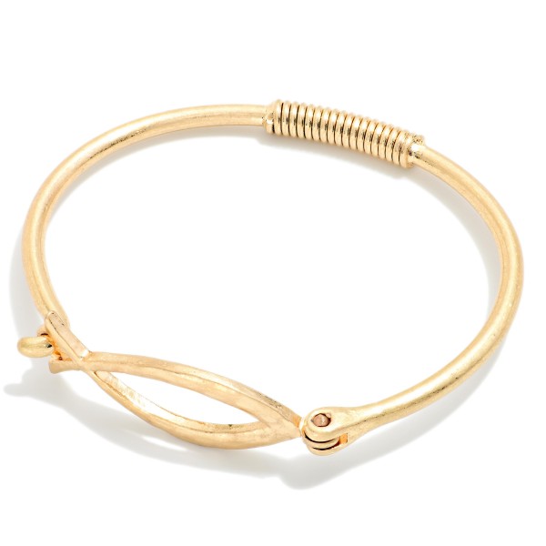 Faith Fish Wire Bangle Bracelet featuring an open Christian fish symbol at the center of a slim wire band with a coiled wrap detail. The hook closure makes it easy to put on and take off. A subtle, meaningful piece for everyday wear that stacks well with other bangles. A thoughtful gift for church groups, baptisms, and Easter, and an affordable faith style for your display.