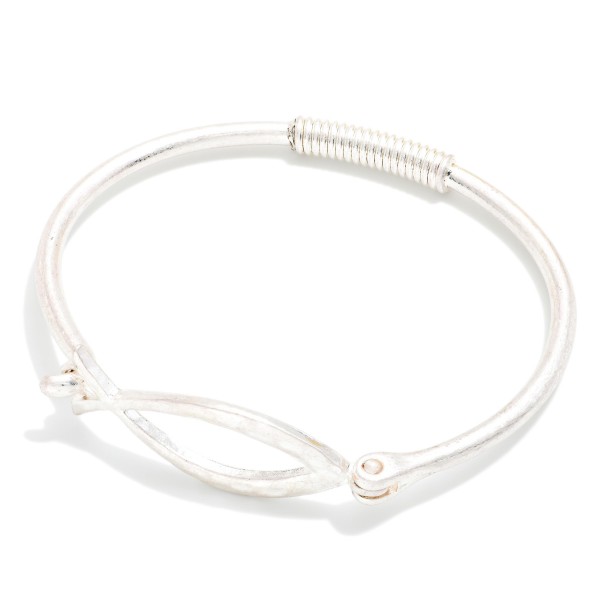 Faith Fish Wire Bangle Bracelet featuring an open Christian fish symbol at the center of a slim wire band with a coiled wrap detail. The hook closure makes it easy to put on and take off. A subtle, meaningful piece for everyday wear that stacks well with other bangles. A thoughtful gift for church groups, baptisms, and Easter, and an affordable faith style for your display.