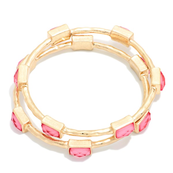 Framed Stone Station Bangle Bracelet with polished square stones set along slim wire bands for an easy stacked look. The clean framed settings give it a refined, vintage inspired finish that dresses up everyday outfits. Slips on easily and pairs well with watches and stretch styles. Offered in a wide range of stone options, it's perfect for building a coordinated bangle display and encouraging multiple purchases.