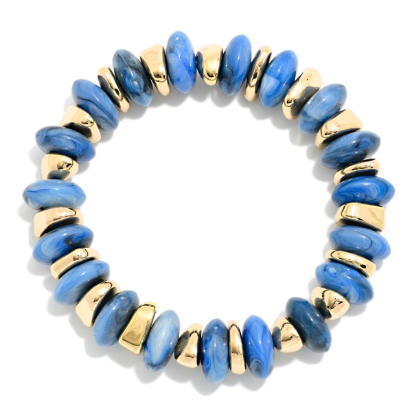 Beaded Stretch Bracelet stacked with chunky rondelle beads and polished metal spacer discs for a bold, textured look. The marbled stone effect beads add depth while the metal accents bring just enough shine. Elastic stretch construction slips on easily and fits most wrists. Wear it solo or stack it with watches and bangles. Beaded stackers are a boutique bestseller, and this style is an easy grab for customers building a bracelet stack.