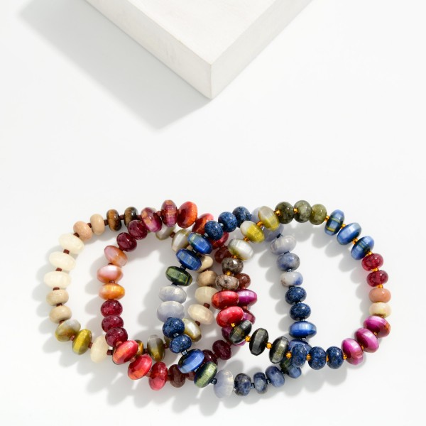 Faceted Crystal Rondelle Stretch Bracelet strung with glass beads in a mixed, iridescent finish that shimmers with every movement. The stretch fit slips on easily and stacks beautifully with bangles, watches, and other beaded pieces. A polished everyday accessory for work, weekends, and holiday events. Pairs with the matching crystal rondelle necklace for an easy set sale and makes a reliable gift item.