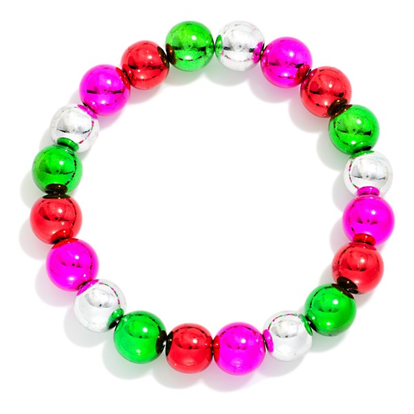 Christmas Ornament Bead Stretch Bracelet strung with shiny metallic finish beads that look like tiny tree ornaments. The stretch fit slips on easily and stacks well with watches, bangles, and other holiday pieces. A festive pick for holiday parties, classroom celebrations, gift exchanges, and Christmas morning. An inexpensive, cheerful accessory that works for kids and adults, making it a great impulse buy and stocking stuffer.