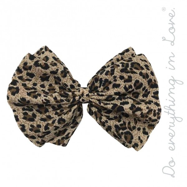 Do everything in Love brand brown leopard print hair bow barrette.

- One size
- Approximately 6" W x 5" L
- 100% Polyester
