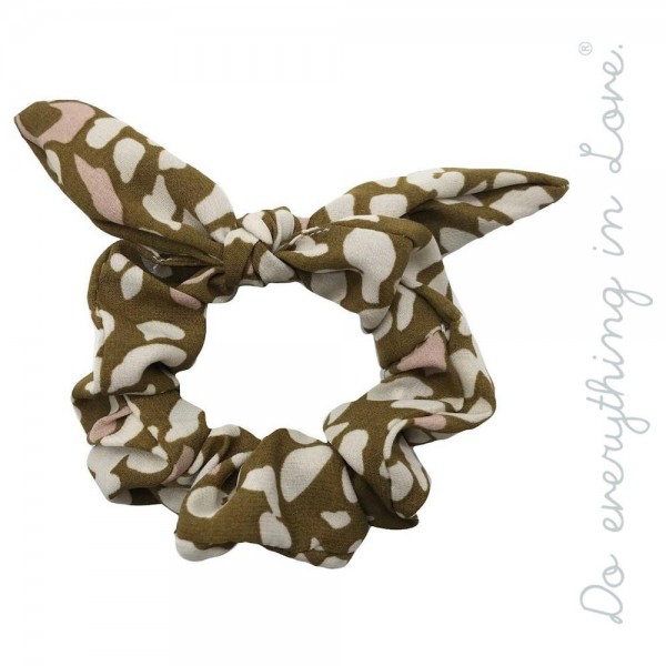 Do everything in Love brand leopard print bow hair scrunchie.

- One size
- 100% Polyester