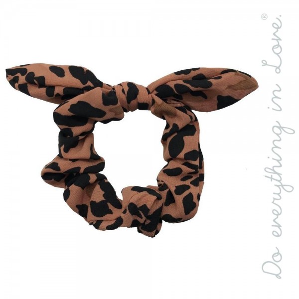 Do everything in Love brand leopard print bow hair scrunchie.

- One size
- 100% Polyester