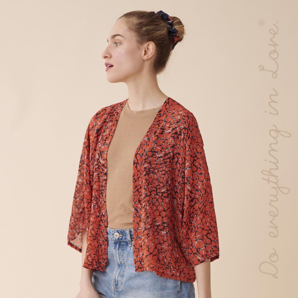 Do everything in Love Brand Women's Lightweight Leopard Print Crop Kimono.

- One size fits most 0-14
- Approximately 28" L
- 100% Polyester