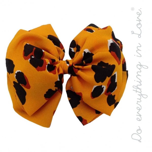 Do everything in Love brand leopard print hair bow barrette.

- One size
- Approximately 6" W x 5" L
- 100% Polyester