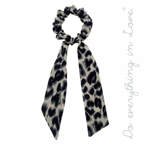 Do everything in Love brand leopard print hair scarf scrunchie.

- One size
- Approximately 7" L
- 100% Polyester