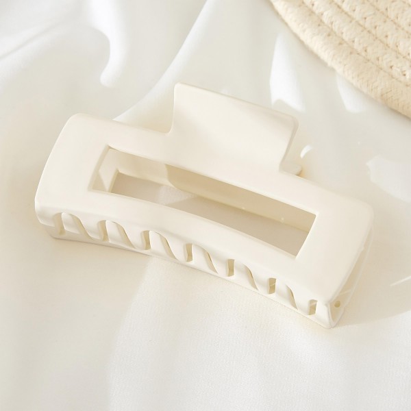 Rectangular Solid Color Matte Hair Claw.

- Approximately 4" L
