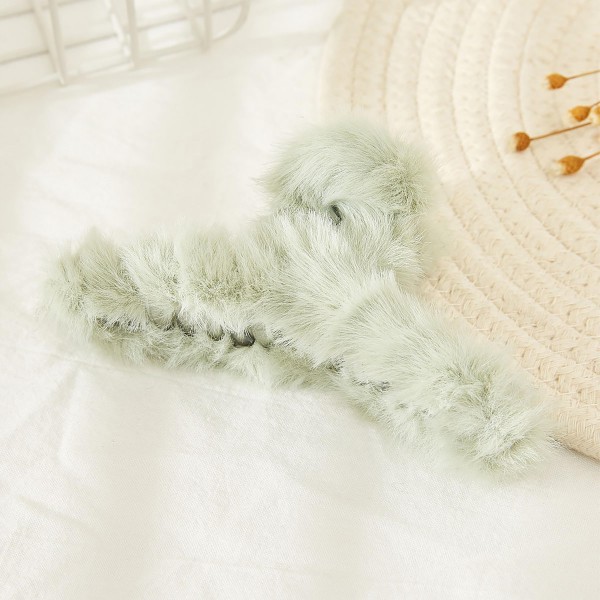 Faux Fur Criss Cross Hair Claw.

- Approximately 4.25" L