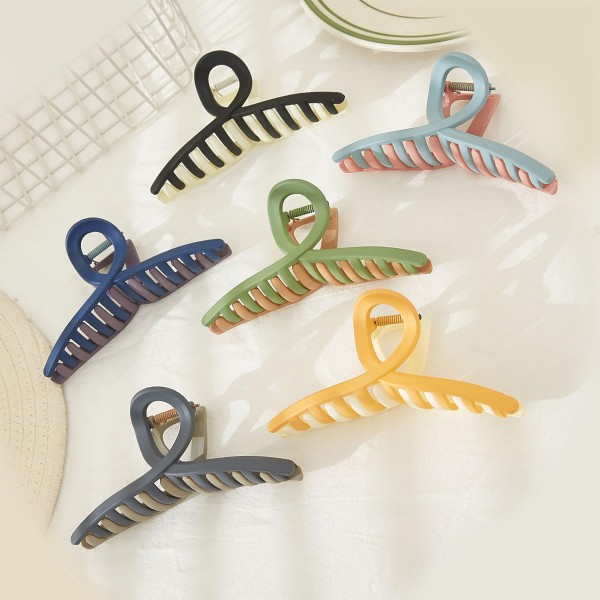Two Tone Criss Cross Hair Claw.

- Approximately 5" L