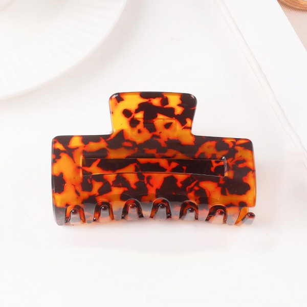 Two Tone Abstract Print Acetate Claw Hair Clip

- Approximately 3" D