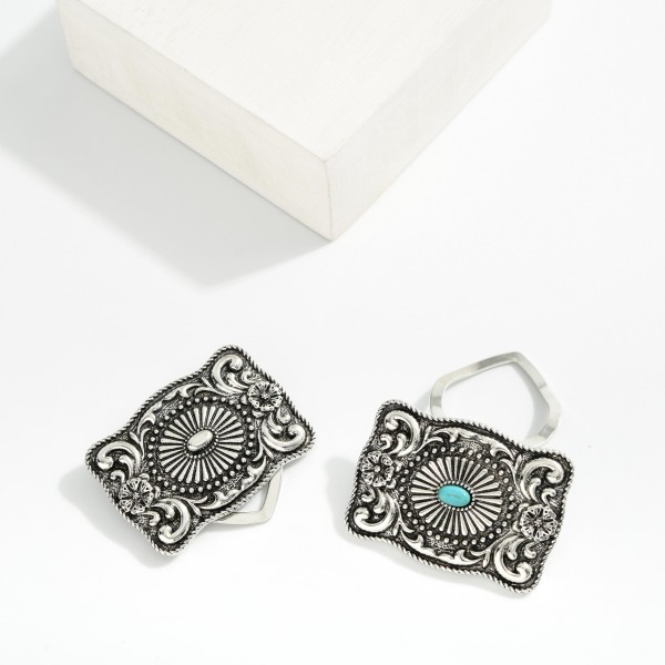 Rectangular Metal Tone Filigree Western Scarf Clip Featuring Turquoise Stone  

- Approximately 1.5" D 