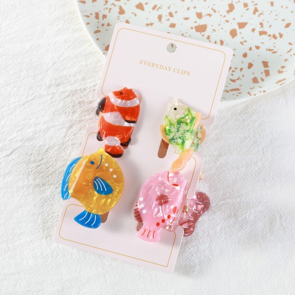 Set Of Four Marbled Acetate Fish Claw Hair Clips 

- Approximately 2" L