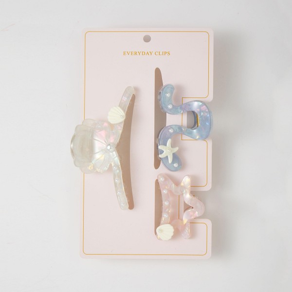 Set Of Three Iridescent Acetate Claw Hair Clips With Pearl Shell & Starfish Details 

- Approximately 1.25" - 4" L