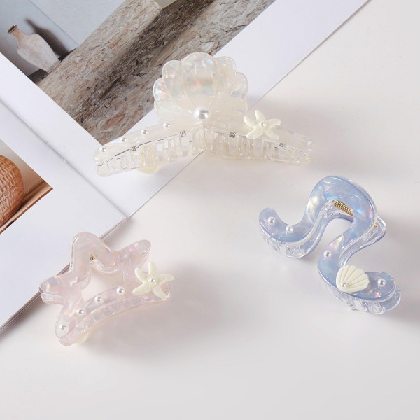 Set Of Three Iridescent Acetate Claw Hair Clips With Pearl Shell & Starfish Details 

- Approximately 1.25" - 4" L