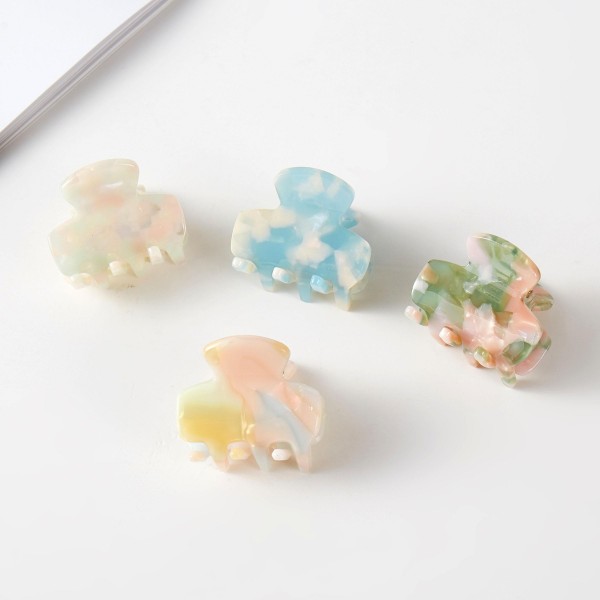 Set Of Four Marbled Acetate Claw Hair Clips 

- Gift Box Included 
- Approximately 1" L