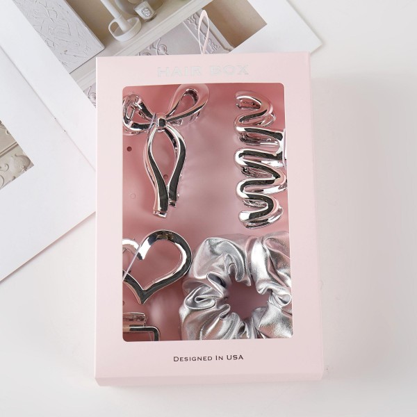Metallic Theme Hair Accessory Box

Box Includes:
- 4 Claw Hair Clips
- 1 Large Scrunchy