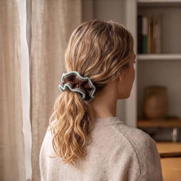 Soft Satin Hair Scrunchie with a silky-smooth finish that's gentle on strands and helps prevent creases and breakage. The elastic core holds ponytails, buns, and half-up styles securely all day while adding an elevated, polished touch. A proven impulse buy at checkout counters — boutique customers stock up on these easy grab-and-go hair accessories in multiples.