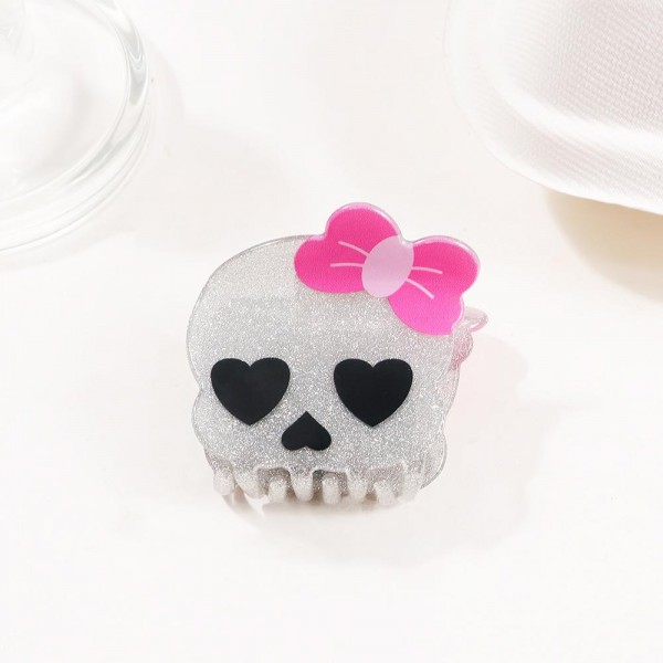 Skelton With Bow Claw Hair Clip

- Approximately 3" L
