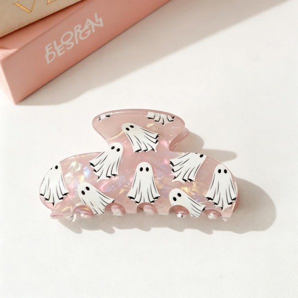 Ghost Claw Hair Clip covered in cute cartoon ghosts on a glossy, shimmery acrylic body. The rounded shape and sturdy spring hinge hold medium to thick hair in a quick twist or half up style that lasts all day. Perfect for Halloween parties, fall festivals, trunk or treat, and spooky season outfits, and a sweet add to treat bags. A seasonal favorite that sells fast through October, these playful clips make an easy register display impulse buy.