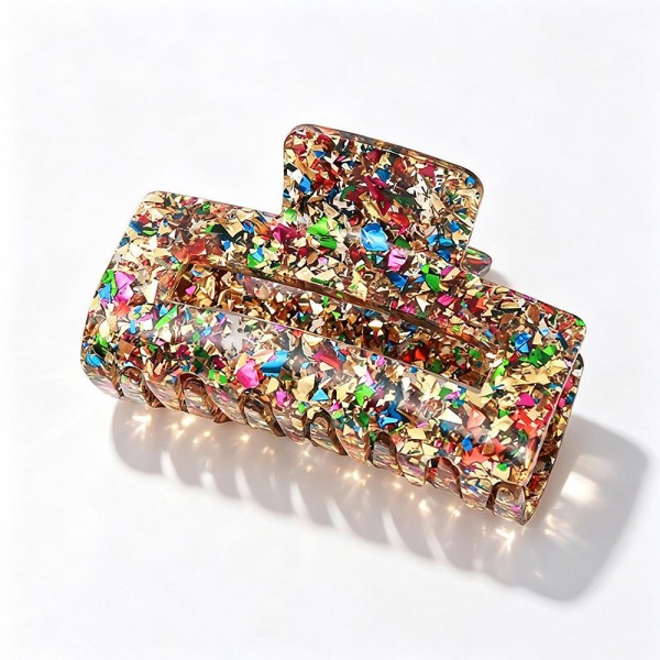 Confetti Glitter Claw Hair Clip, a sparkly statement clip packed with chunky foil flakes set in a glossy acrylic finish. The large rectangular shape and sturdy spring hinge hold thick or long hair in a quick twist, half up style, or easy updo without slipping. A fun everyday accessory for school, work, and weekend outfits that also makes a great stocking stuffer or party favor. Shimmery, affordable, and impossible to walk past, these clips are an easy impulse add at the register.