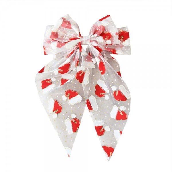 Holiday print bow hair clip with long trailing tails and a snap base that holds securely in fine or thick hair. The seasonal print gives an instant festive touch to a ponytail or a half up style with no effort at all. Lightweight enough to wear through a full day of parties, dinners, and photos. Holiday hair bows are a reliable impulse buy from the first display change through Christmas week.