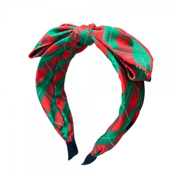 Knotted bow headband in a holiday print, built on a padded band that stays comfortable through a long day of parties and photos. The top knot bow is stitched to keep its shape so it will not droop by the afternoon. An easy festive finish for Christmas mornings, classroom parties, and family portrait sessions. Seasonal headbands sell out fast once holiday displays go up and they reorder well.