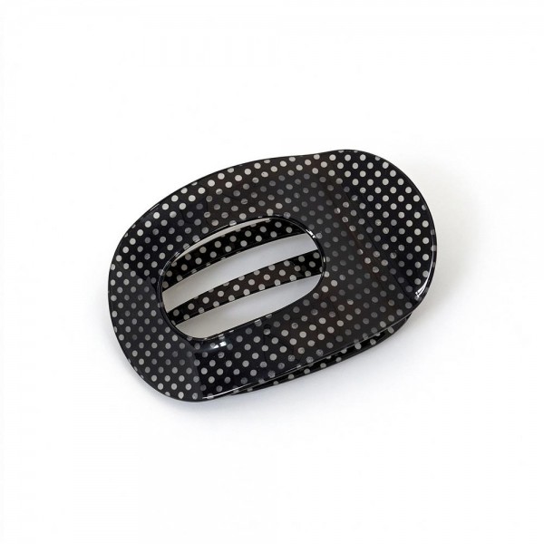 Pin Dot Translucent Flat Claw Clip with a glossy see through finish, an open oval center, and secure interlocking teeth. The flat profile stays comfortable against the head while holding twists, low buns, and half up styles in place all day. Tiny dots add a subtle pattern that works with everyday outfits and dressier looks alike. An affordable, trend right hair accessory that boutique shoppers love to buy in multiples.