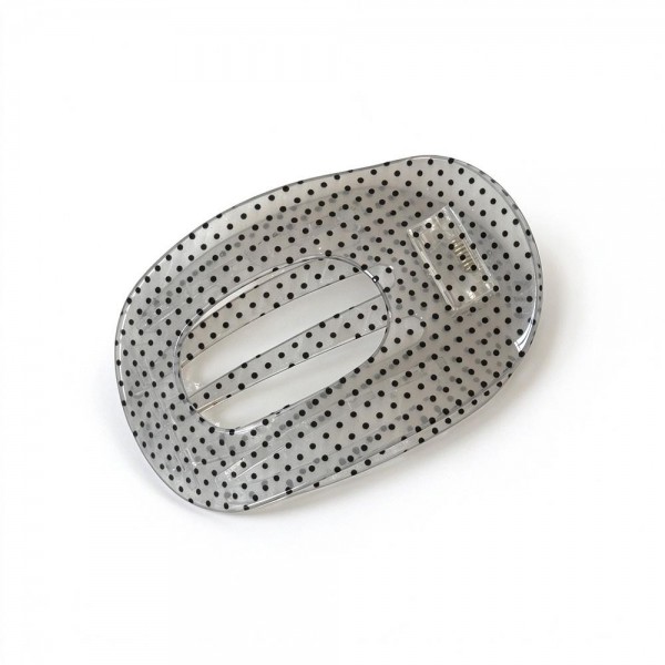 Pin Dot Translucent Flat Claw Clip with a glossy see through finish, an open oval center, and secure interlocking teeth. The flat profile stays comfortable against the head while holding twists, low buns, and half up styles in place all day. Tiny dots add a subtle pattern that works with everyday outfits and dressier looks alike. An affordable, trend right hair accessory that boutique shoppers love to buy in multiples.