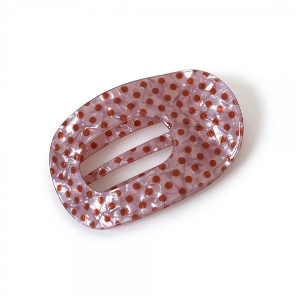 Pin Dot Translucent Flat Claw Clip with a glossy see through finish, an open oval center, and secure interlocking teeth. The flat profile stays comfortable against the head while holding twists, low buns, and half up styles in place all day. Tiny dots add a subtle pattern that works with everyday outfits and dressier looks alike. An affordable, trend right hair accessory that boutique shoppers love to buy in multiples.